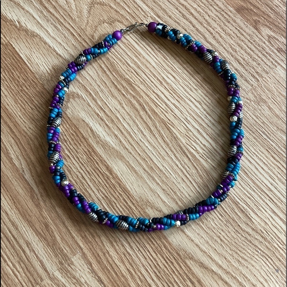 2 vintage bead necklaces. 2 different lengths, 2 main colours, purple.